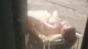 Italian Wife caught while masturbating during sunbathing