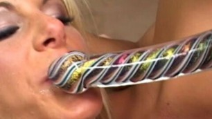 Busty blond coed rides a massive cock, then gags on it during orgy